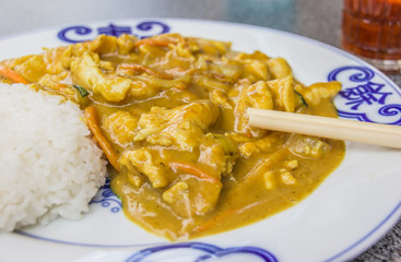 Chinese chicken in peanut sauce, served with rice