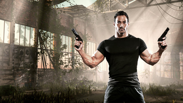 Action hero muscled man holding two guns. Standing in abandoned