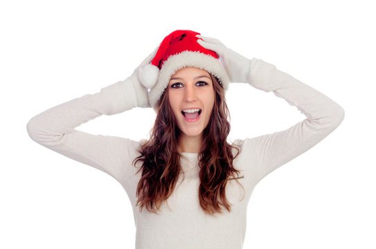 Surprised casual girl with Christmas hat
