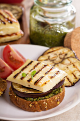 Vegetarian burger with cheese, eggplant and pesto