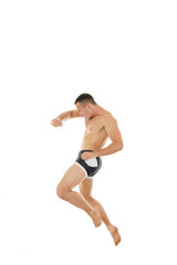 Obraz premium Powerful fighter attack position portrait