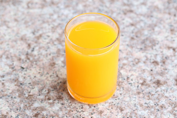 Glass of orange juice.