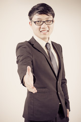 Successful young business man of Asian, full length portrait iso