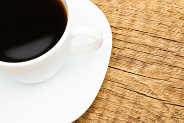 Ceramic coffee cup on wooden table - studio shoot