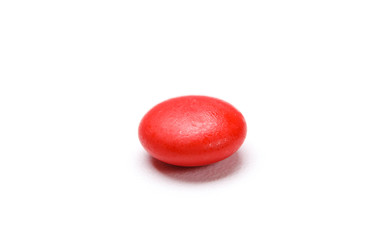 Red pill, isolated on white. Healthcare concept.