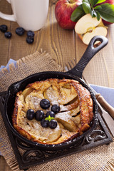 Baking with apple, sugar and cinnamon