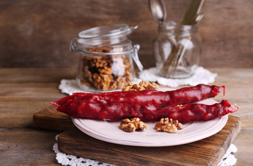 Tasty oriental sweets (churchkhela) and fresh nuts,