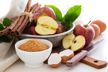Baking with apple, sugar and cinnamon