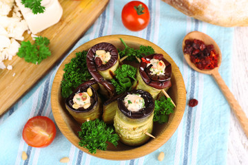 Fried aubergine in a bowl with cottage cheese, bread and