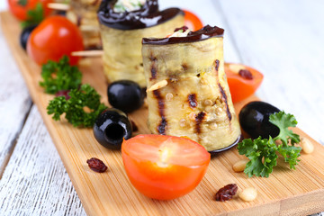 Fried aubergine with cottage cheese and parsley in n a cutting