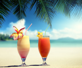 fresh fruit juices on a tropical beach