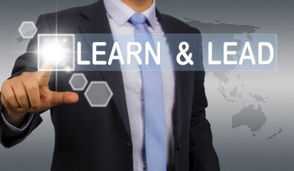 learn and lead:business man touching screen interface