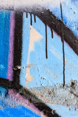 Close up of blue graffiti and dripping paint