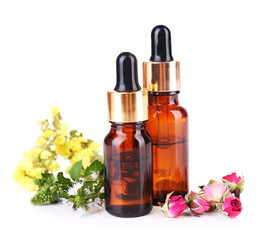 Essential oil with different medicine plants, isolated on white
