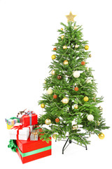 Decorated Christmas tree with gifts isolated on white