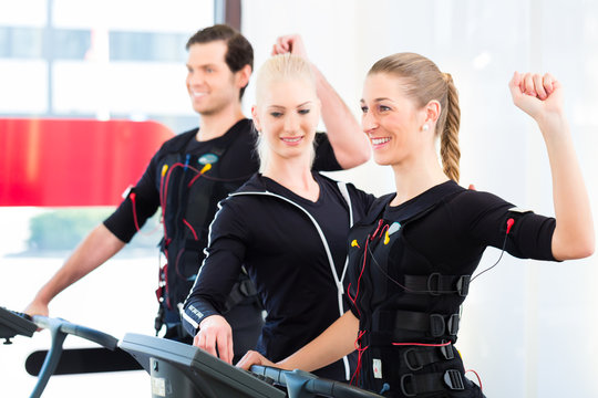 Man and woman having ems training