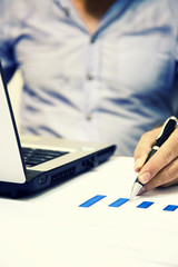 Man working on business report