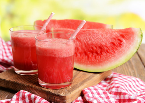 Juicy watermelon on table on bright background