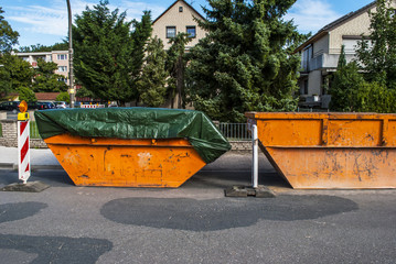 Road reconstruction - rubbish skip