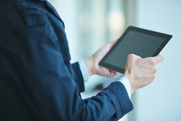 men holding digital tablet