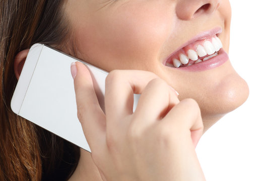 Close Up Of A Woman Smiling And Calling On The Mobile Phone