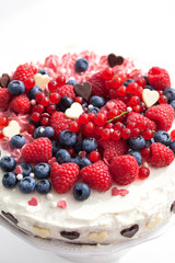 Homemade creamy cake decorated with fresh berries