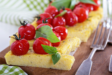 Polenta tart with baked tomatoes