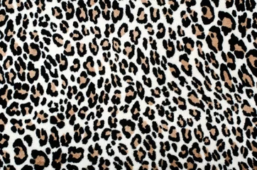 Fototapeten Brown und schwarzes Leopardenmuster. Pelztierdruck als Hintergrund. © luanateutzi