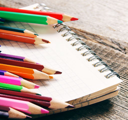 School tools. On wooden background.