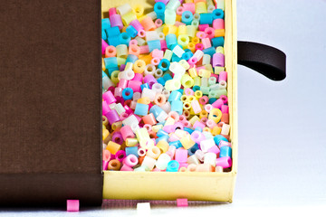 close up of pixel beads, plastic granules or plastic beads