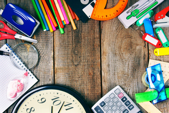 Back To School. School Tools Around. Wooden Background.