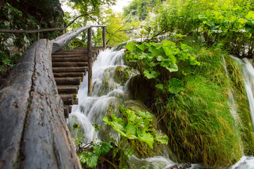 Wooden path and waterfall in Plitvice National Park, Croatia