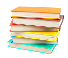 Multi-coloured books. On white background.
