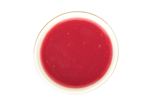 Berry Kisel drink in a cup on a white background - a top view