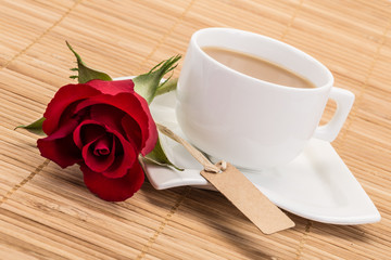 coffee and rose on table