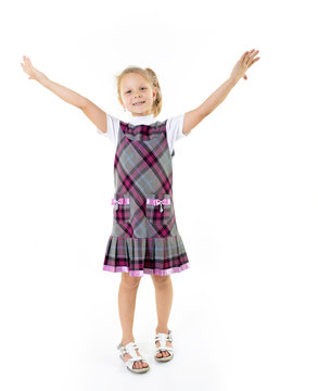 happy excited little girl dancing on white background