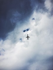 Airplane and dark clouds