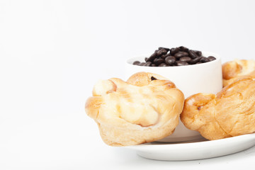 Roasted coffee beans in a glass