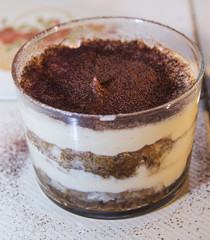 Traditional italian dessert tiramisu in a glass