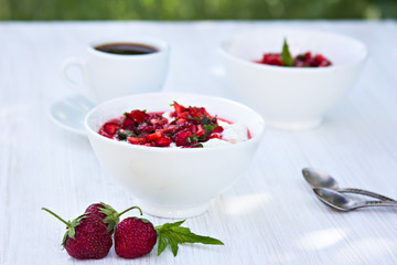 Cottage cheese with strawberries and coffee