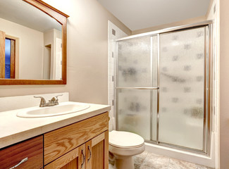 Bathroom interior. Glass door shower