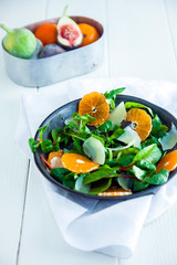 Healthy mache salad with oranges and parmesan