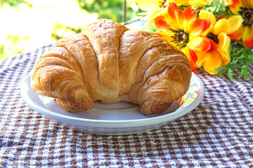 Some croissants on dish