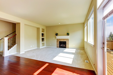 Empty house interior. Living room with fireplace