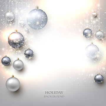 Elegant shiny Christmas background with baubles and place for te