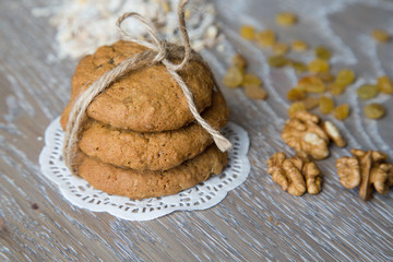Three oat biscuits with raisins and wallnuts