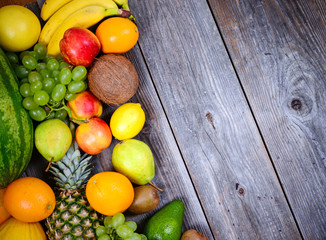 Huge group of fresh colorful fruit on wooden background - High q