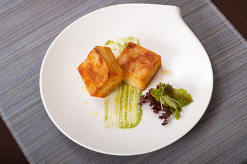 Fried cheese with greens