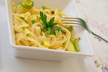 Italian pasta- tagliatelle with zucchini, garlic and fresh parsl