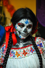 Fototapeta na wymiar Woman disguised for Dia de los Muertos, Puebla, Mexico